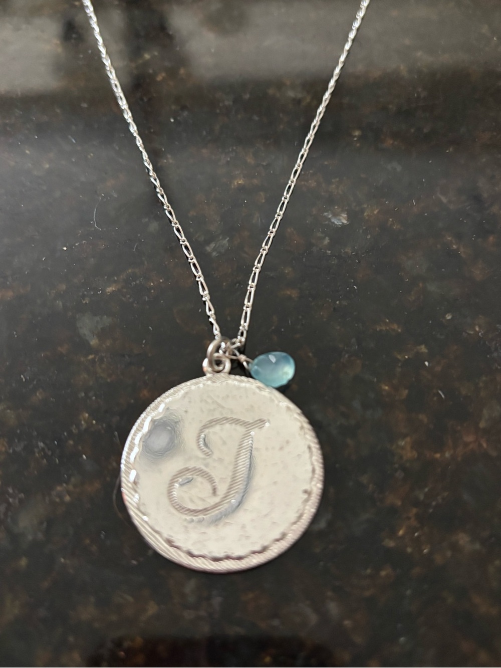 Silver plated ‘J' Initial Disc Necklace with Blue Teardrop Charm